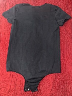 Skims crew bodysuit size L/XL never worn